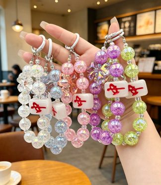 Fortune Mahjong phone chain, crack bead bead butterfly pendant, popping flower bead lucky red middle phone pendant wholesale